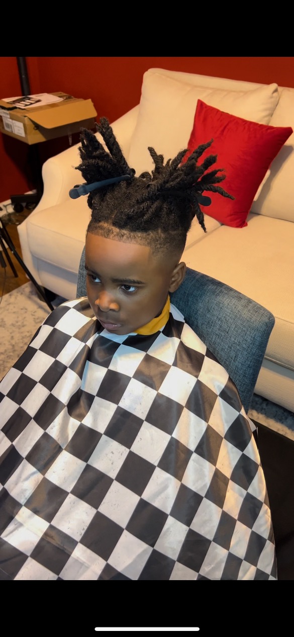 Signature fade haircut with crisp lines